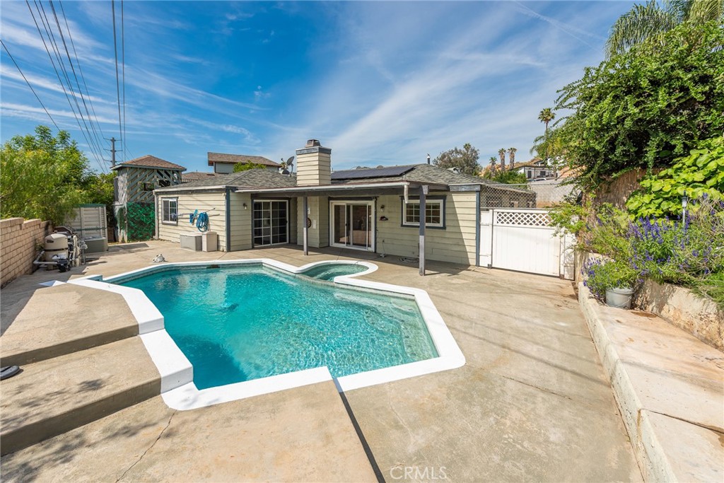 3208 Gibraltar Dr. Riverside, CA 92506 - Photo 28 of 37 a front view of a house with a yard