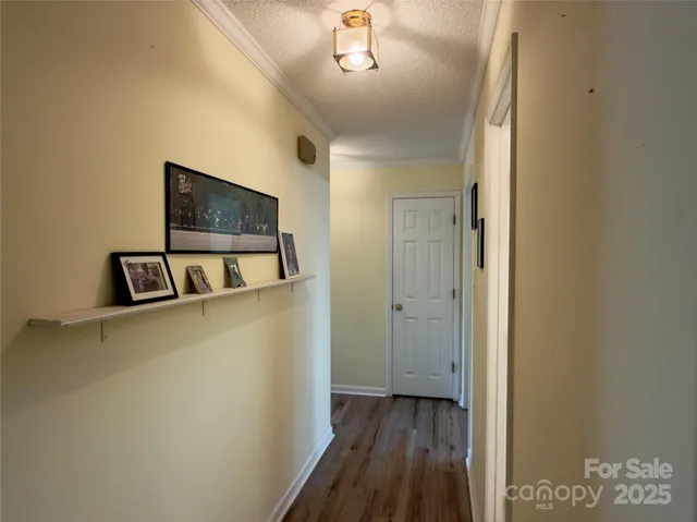 a view of a livingroom with wooden floor