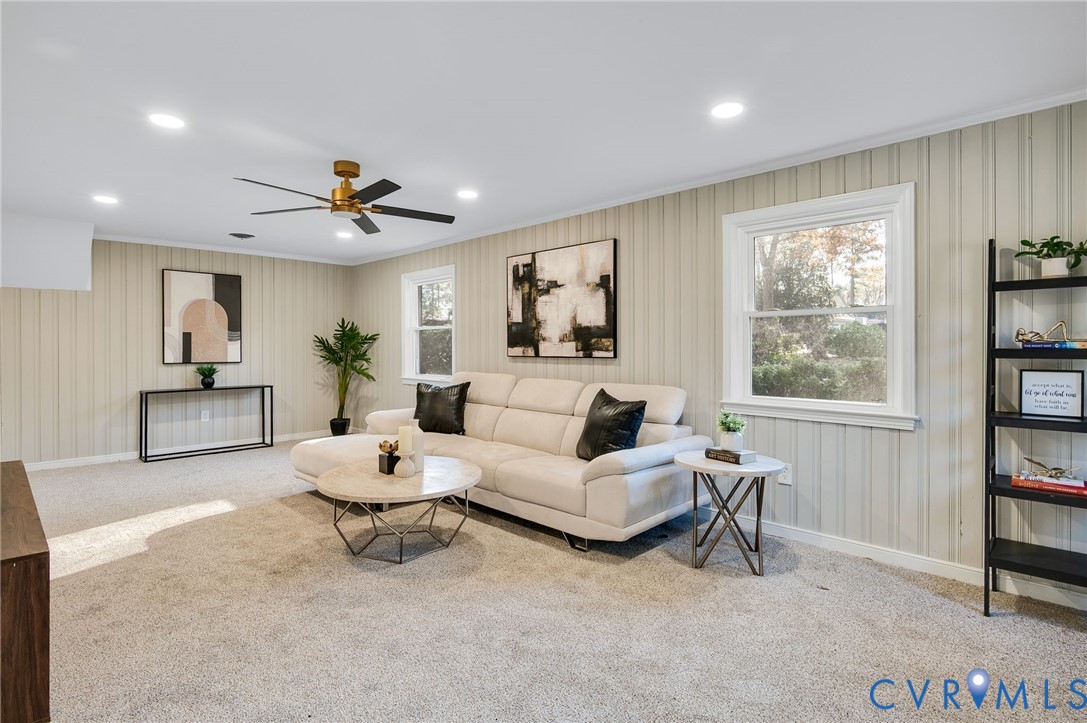 8513 Spring Hollow Drive Richmond, VA 23227 - Photo 18 of 49 a living room with furniture and a window