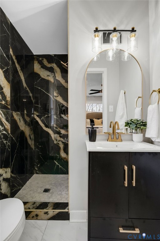 8513 Spring Hollow Drive Richmond, VA 23227 - Photo 25 of 49 a bathroom with a sink and a mirror