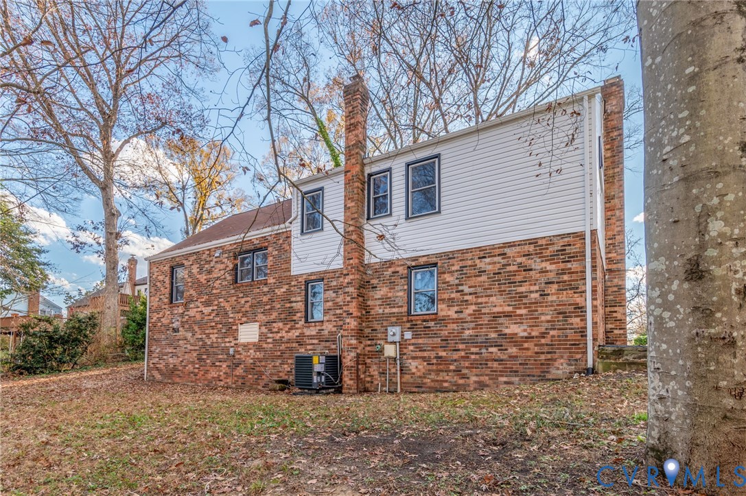 8513 Spring Hollow Drive Richmond, VA 23227 - Photo 37 of 49 a view of a house with a yard
