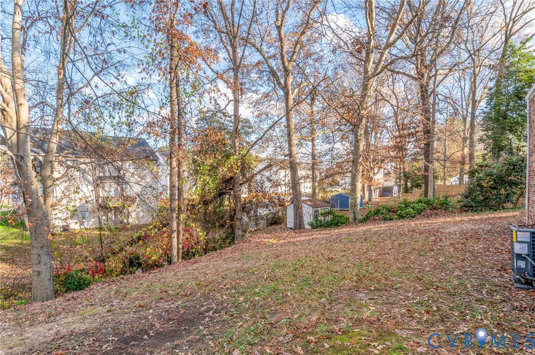 8513 Spring Hollow Drive Richmond, VA 23227 - Photo 49 of 49 a view of a road with trees