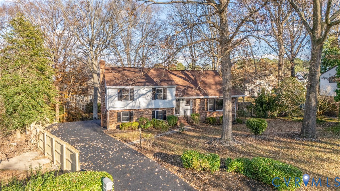 8513 Spring Hollow Drive Richmond, VA 23227 - Photo 5 of 49 a view of a house with a yard