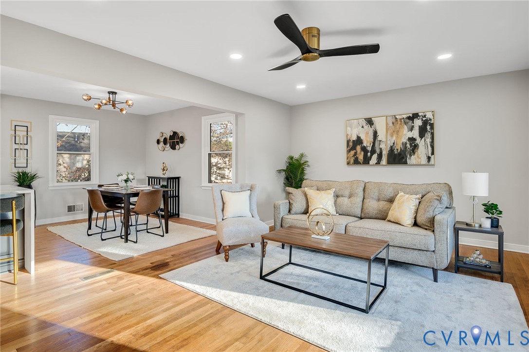 8513 Spring Hollow Drive Richmond, VA 23227 - Photo 7 of 49 a living room with furniture and wooden floor