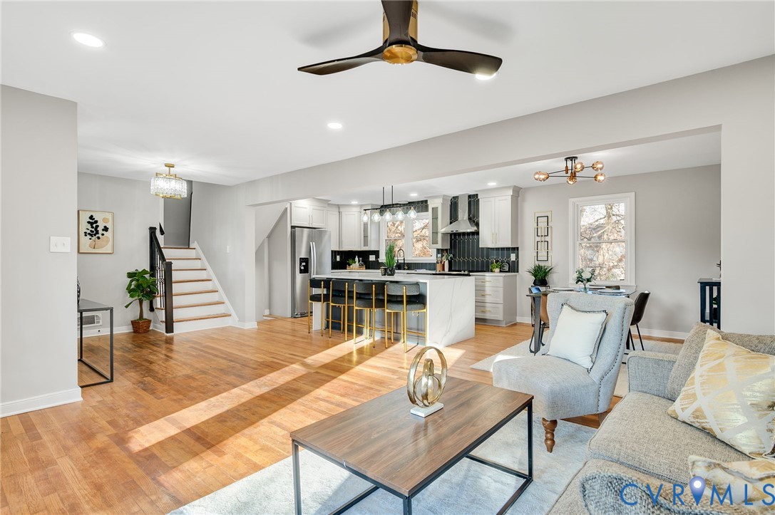 8513 Spring Hollow Drive Richmond, VA 23227 - Photo 8 of 49 a living room with furniture and kitchen view