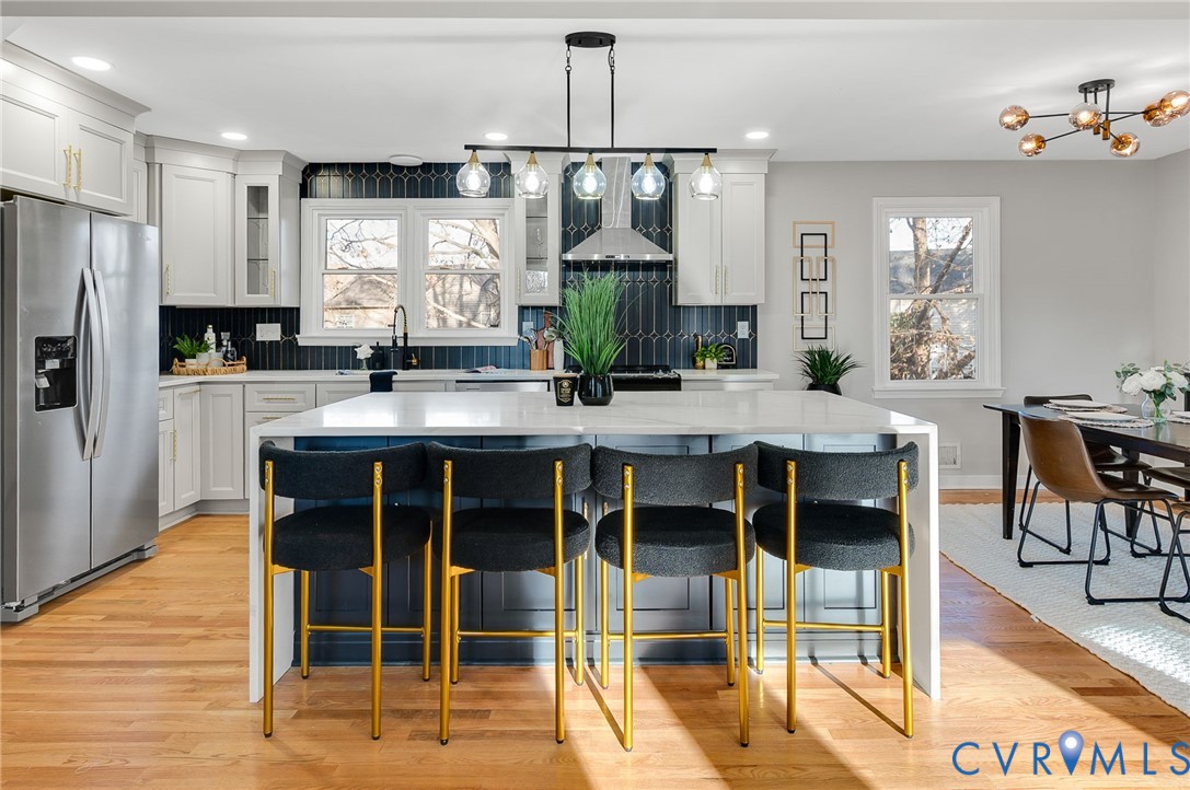 8513 Spring Hollow Drive Richmond, VA 23227 - Photo 9 of 49 a view of a dining room with furniture
