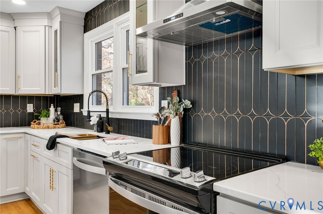 8513 Spring Hollow Drive Richmond, VA 23227 - Photo 10 of 49 a kitchen with a sink appliances and cabinets