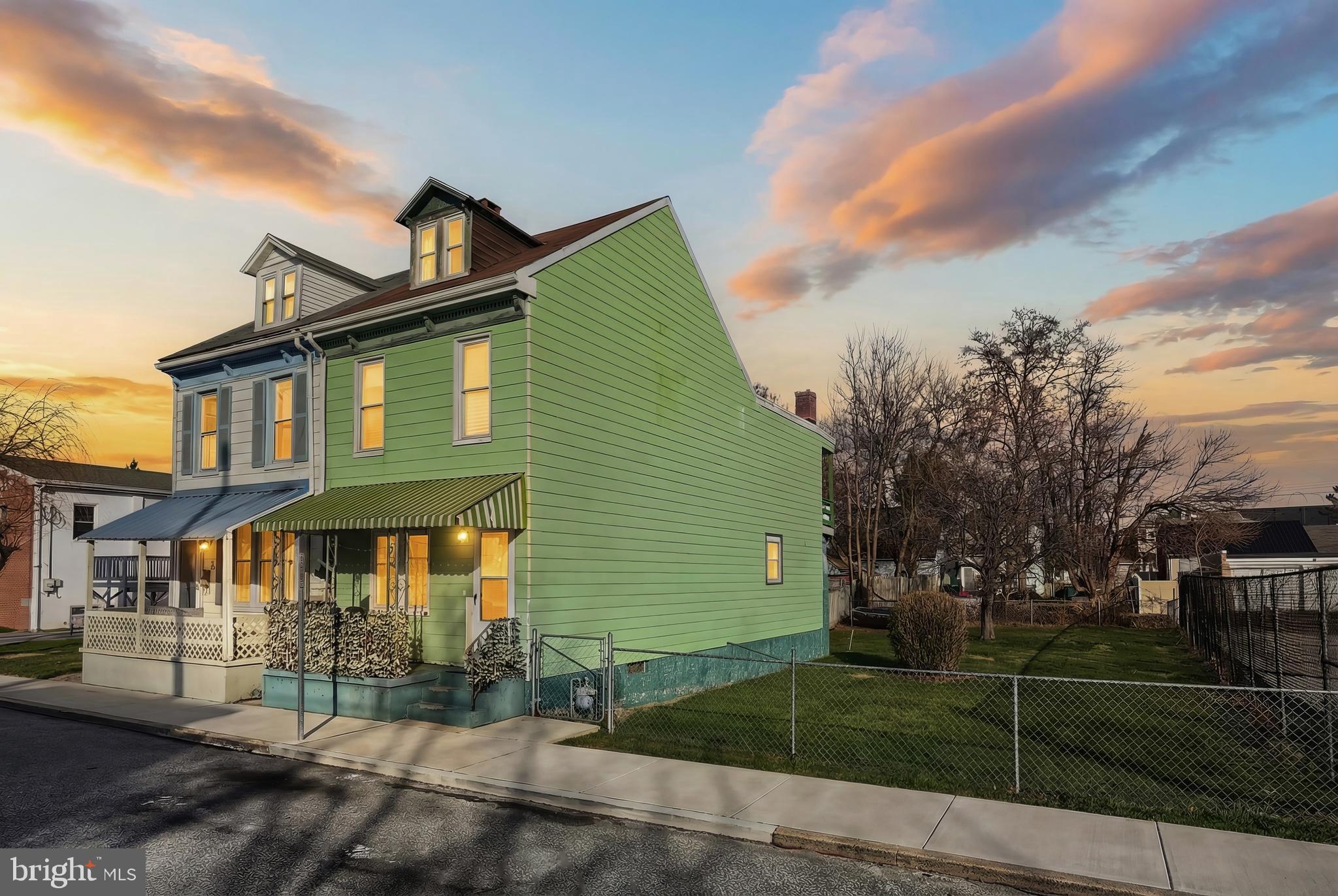 381 Simpson Street York, PA 17403 - Photo 1 of 21 a front view of a house with a garden