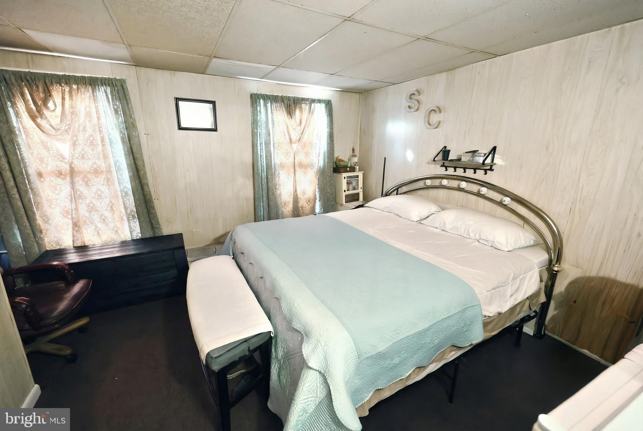 381 Simpson Street York, PA 17403 - Photo 14 of 21 a bed sitting in a bedroom next to a window