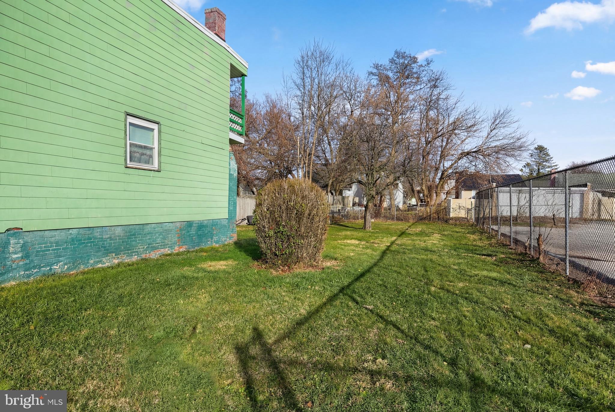 381 Simpson Street York, PA 17403 - Photo 19 of 21 a view of a backyard with plants and large trees