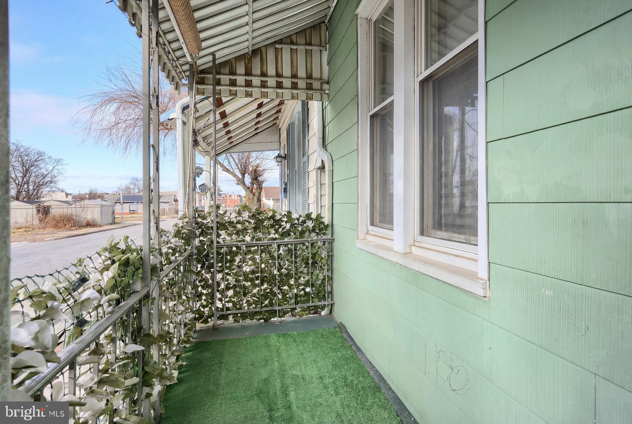 381 Simpson Street York, PA 17403 - Photo 4 of 21 a view of a wooden door and a window