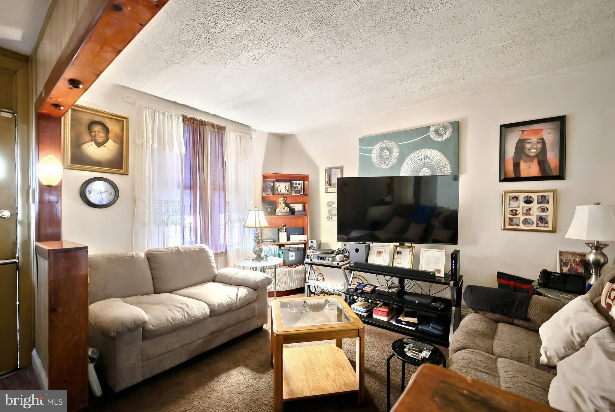 381 Simpson Street York, PA 17403 - Photo 6 of 21 a living room with furniture and a flat screen tv