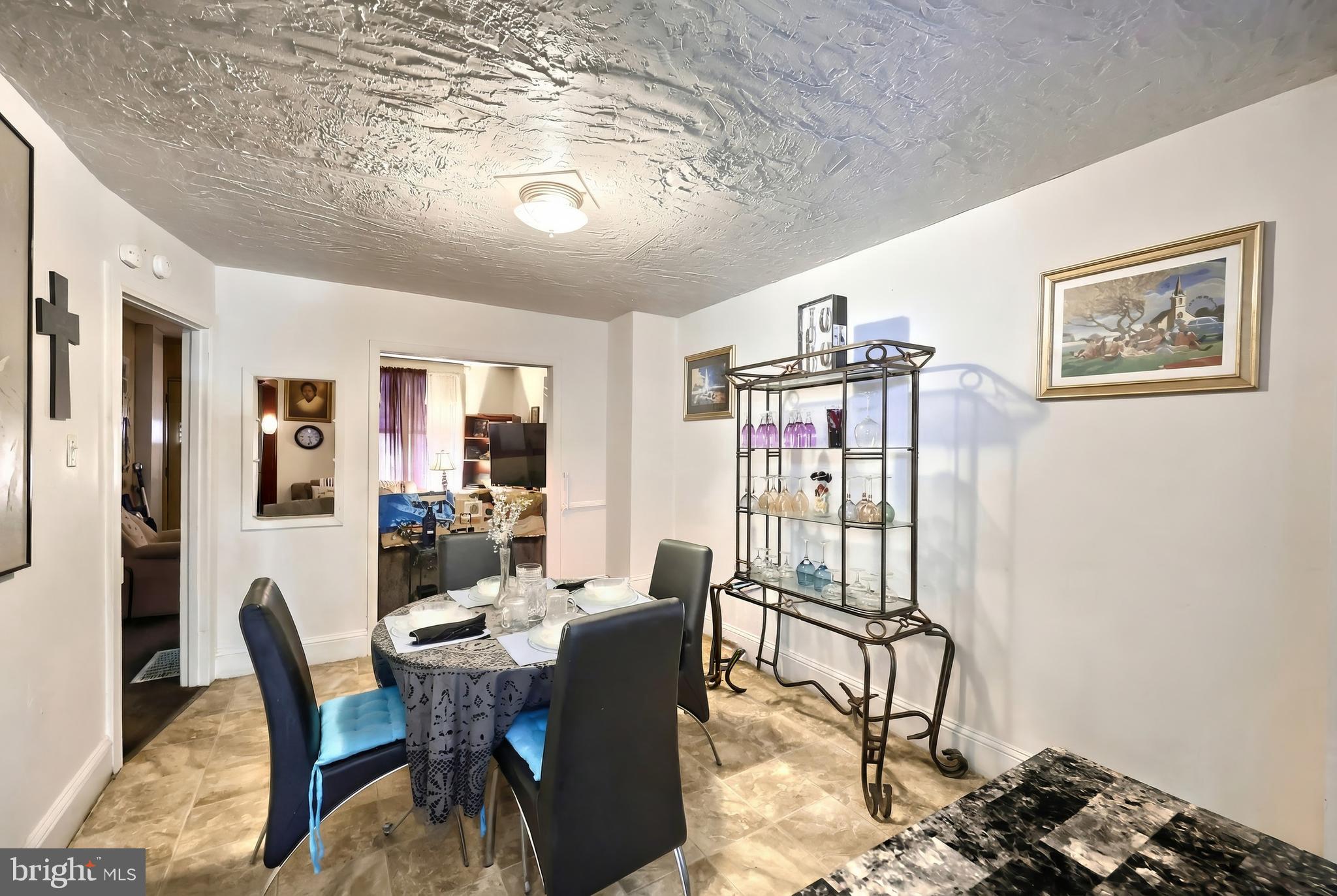 381 Simpson Street York, PA 17403 - Photo 9 of 21 a view of a dining room with furniture window and wooden floor