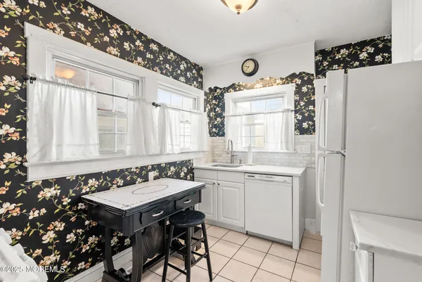 a kitchen with a stove and a microwave