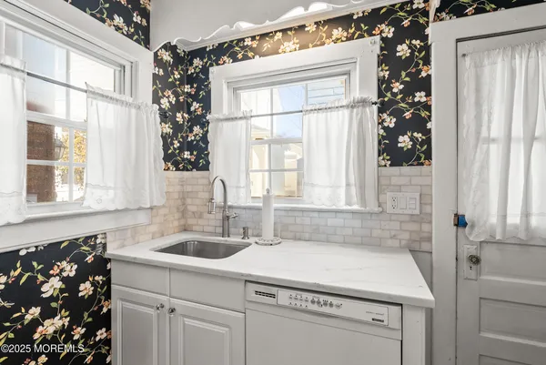 a living room with a couch and a flat screen tv