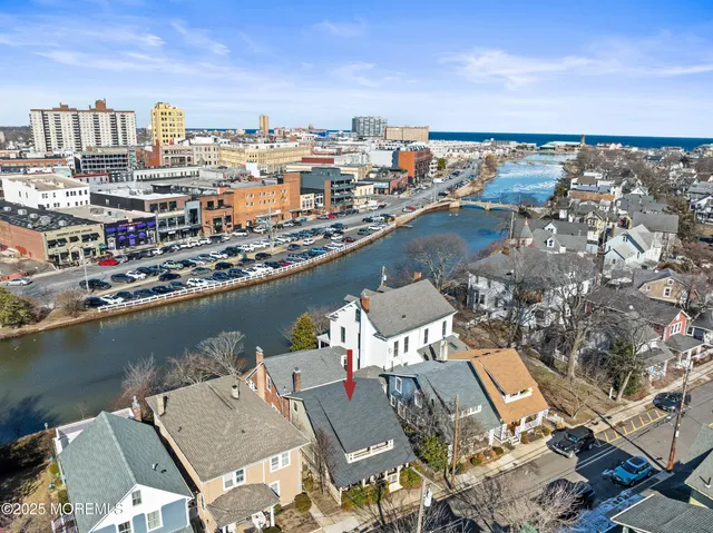 an aerial view of a city with outdoor seating