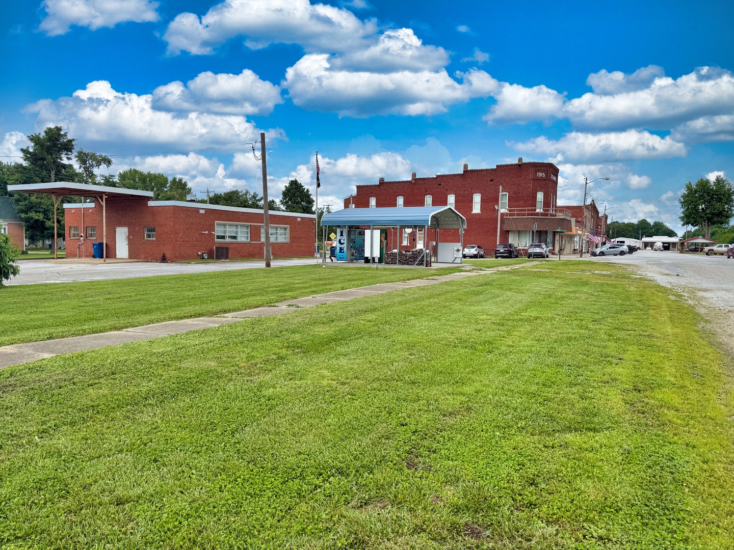 300 Front Street Xenia, IL 62899 - Photo 12 of 21 a view of a big yard with a building in the background