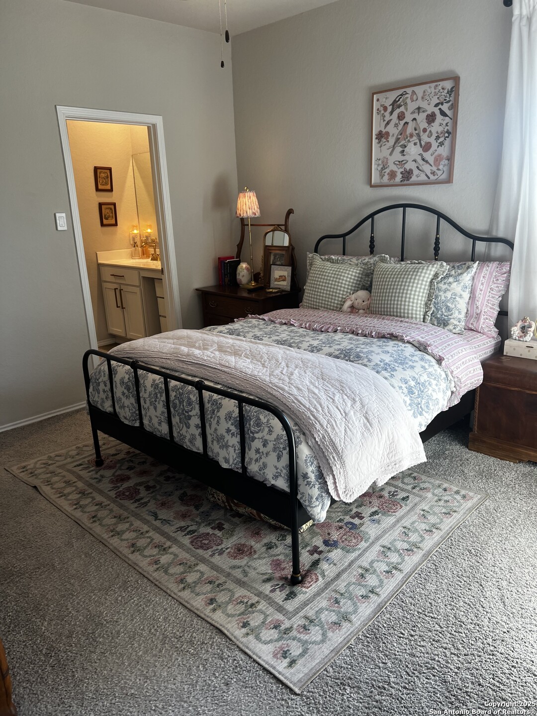 7602 Alameda Beach Converse, TX 78109 - Photo 15 of 39 a bedroom with a bed and wooden floor