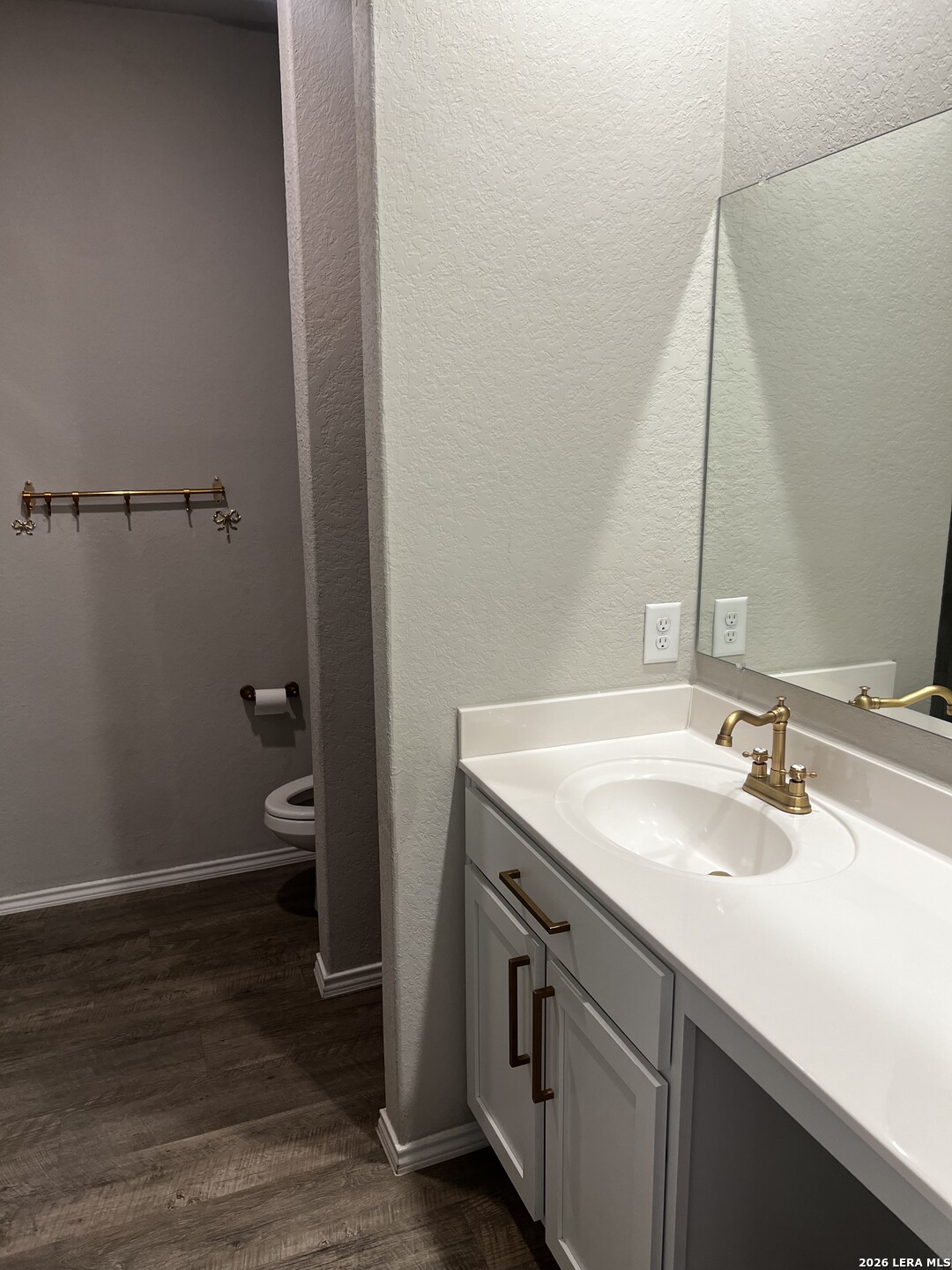 7602 Alameda Beach Converse, TX 78109 - Photo 21 of 39 a bathroom with a sink and a mirror