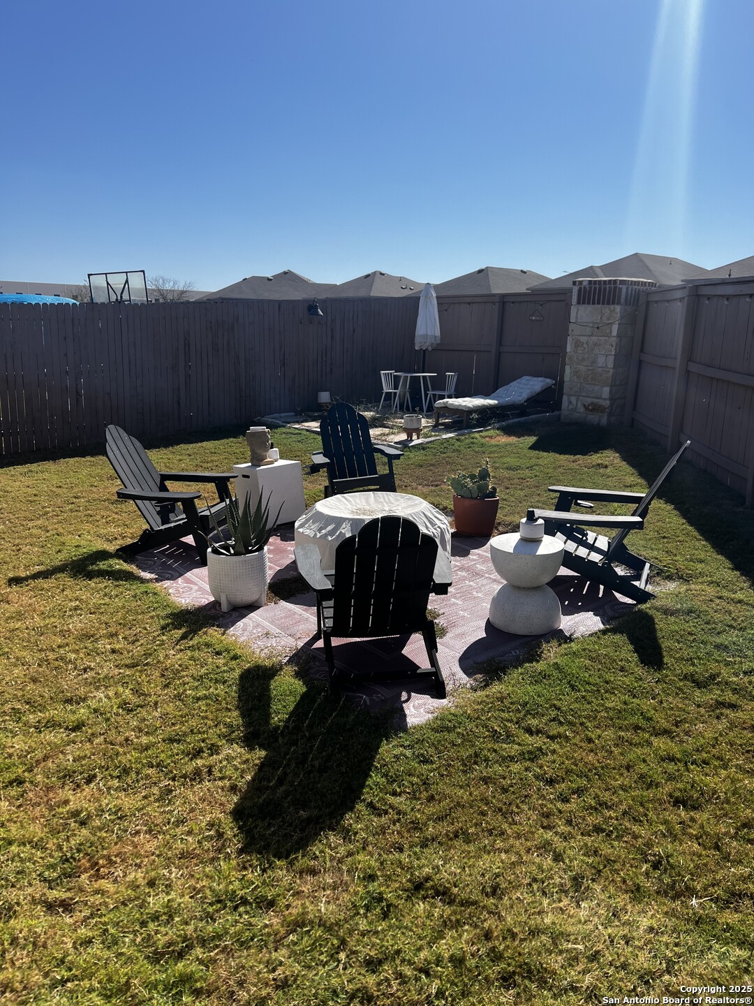 7602 Alameda Beach Converse, TX 78109 - Photo 22 of 23 a view of a lake with lawn chairs