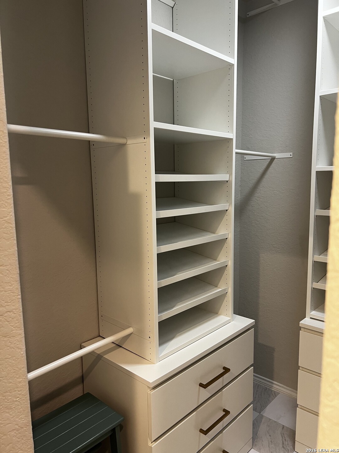 7602 Alameda Beach Converse, TX 78109 - Photo 25 of 39 a view of walk in closet with empty racks