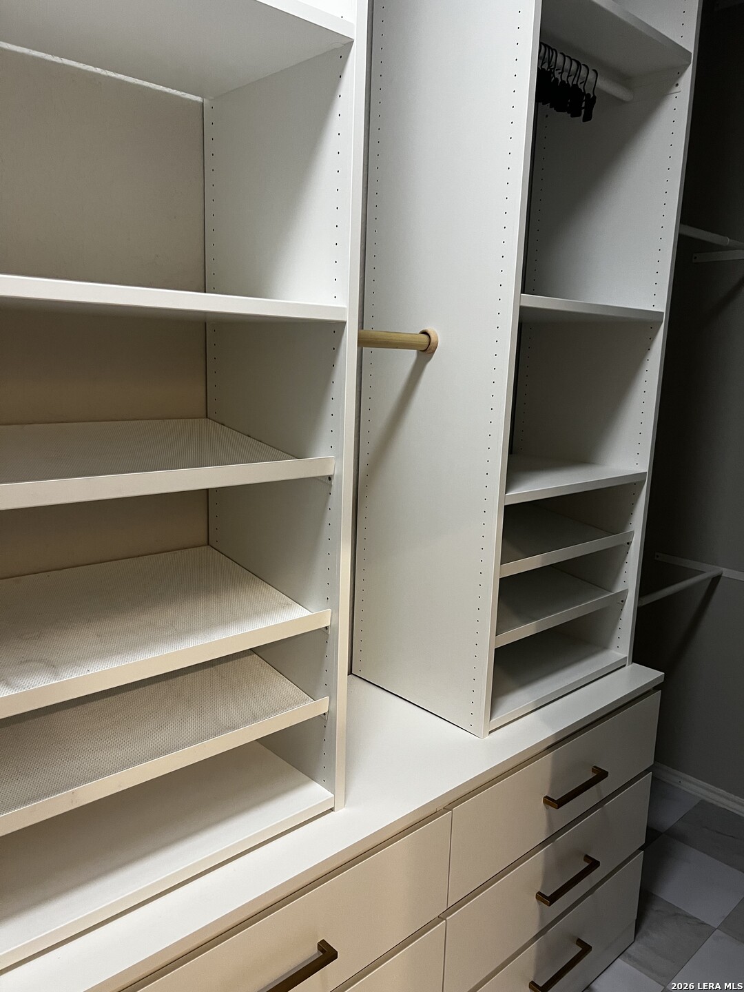 7602 Alameda Beach Converse, TX 78109 - Photo 26 of 39 a view of walk in closet with empty racks