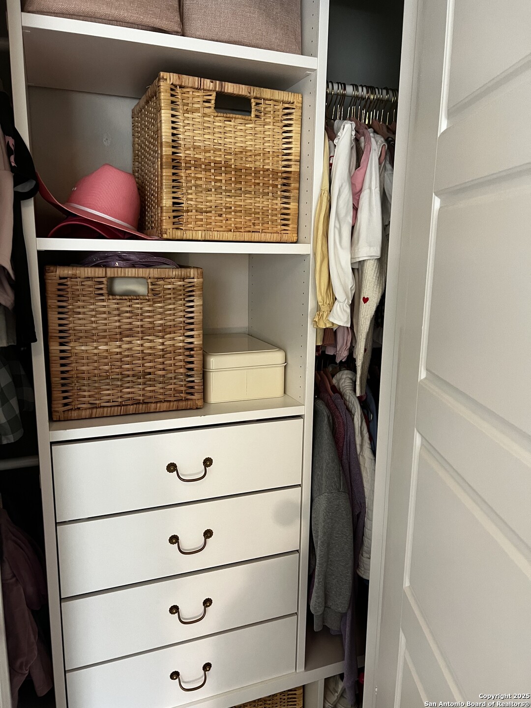 7602 Alameda Beach Converse, TX 78109 - Photo 29 of 39 a view of walk in closet with clothes and shoes