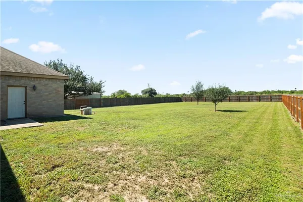 a view of a lake with a big yard