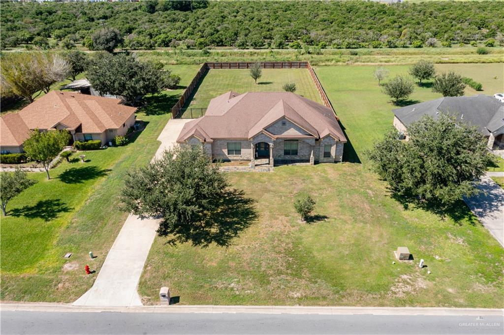 917 Beddoes Road La Feria, TX 78559 - Photo 16 of 20 an aerial view of a house with a yard and lake view