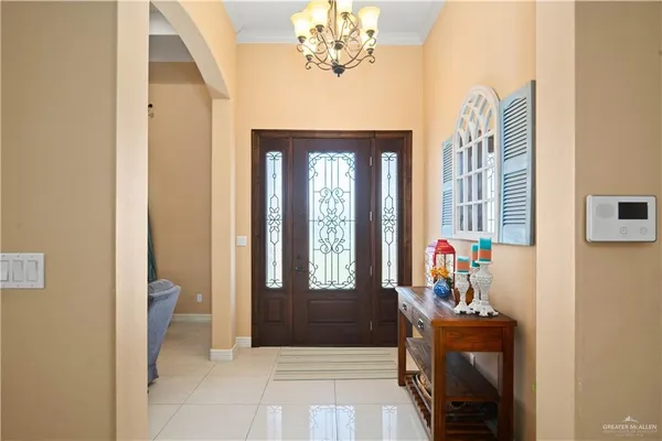 a view of hall way with furniture
