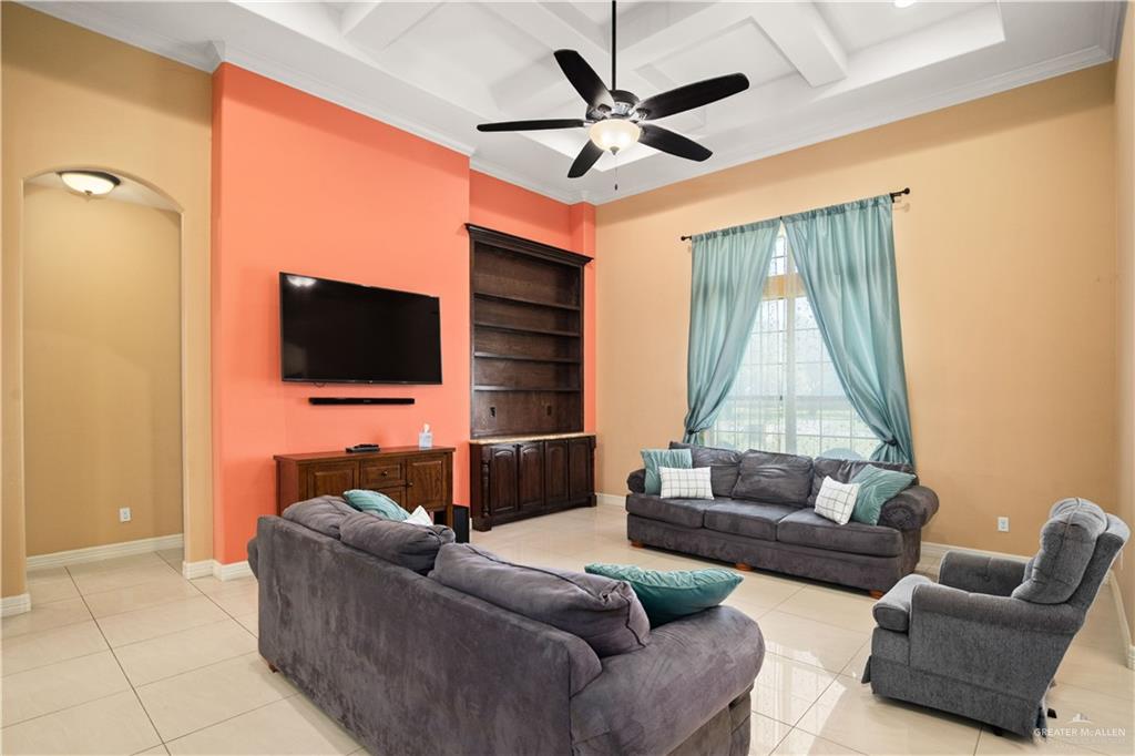917 Beddoes Road La Feria, TX 78559 - Photo 7 of 20 a living room with furniture and a flat screen tv