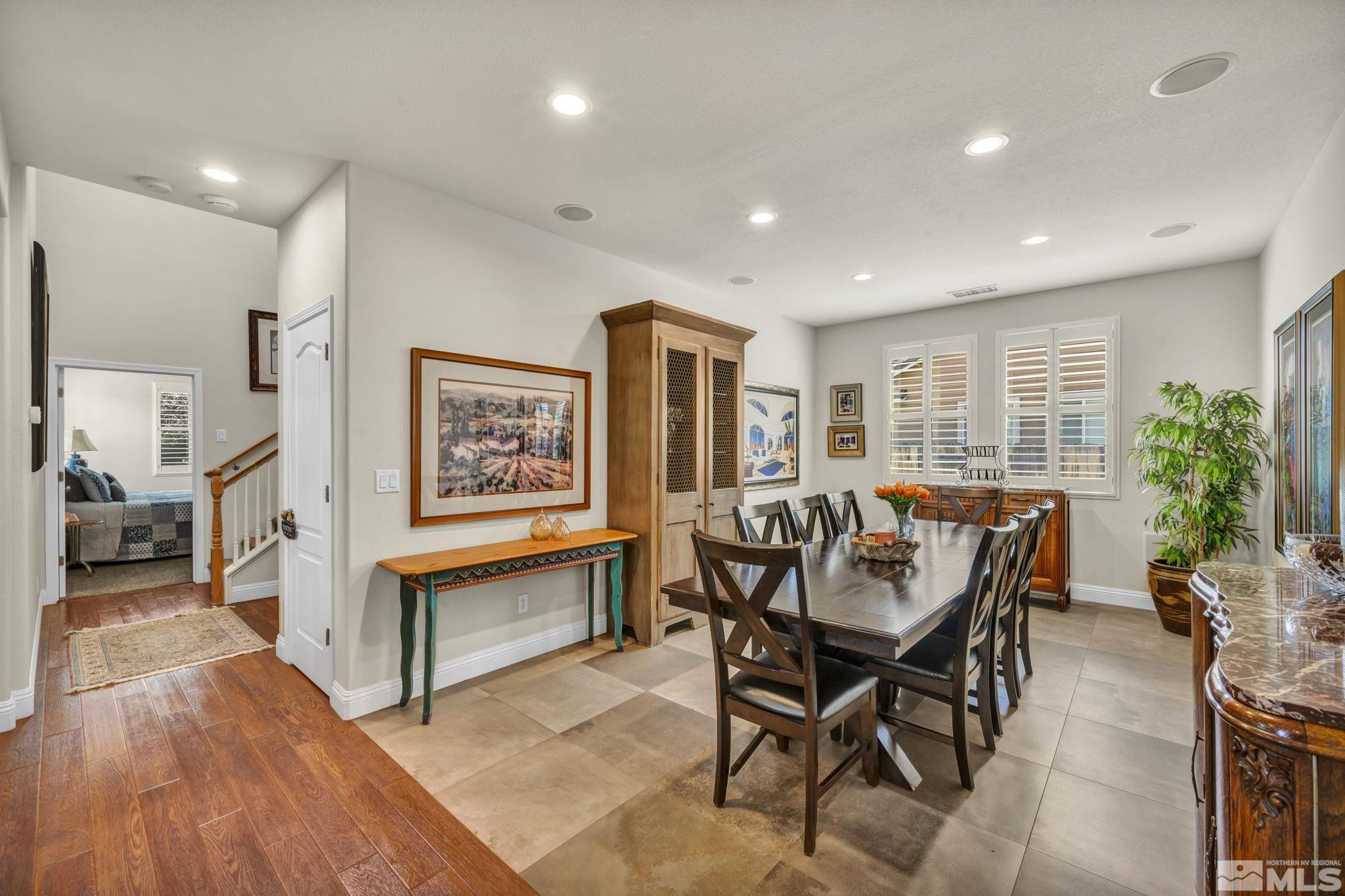 2199 Angel Ridge Drive Reno, NV 89521 - Photo 12 of 36 a view of a a dining room with furniture window and wooden floor