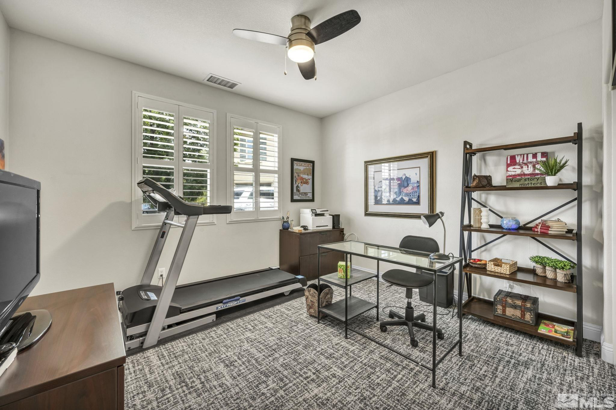 2199 Angel Ridge Drive Reno, NV 89521 - Photo 15 of 36 a room with table chairs and windows