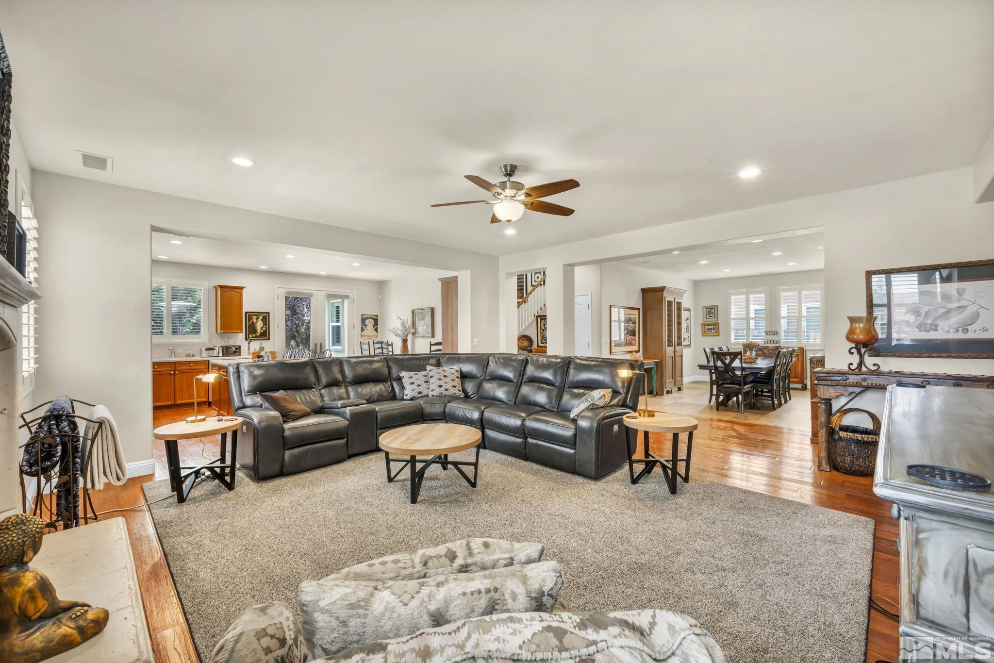 2199 Angel Ridge Drive Reno, NV 89521 - Photo 2 of 36 a living room with furniture and a flat screen tv