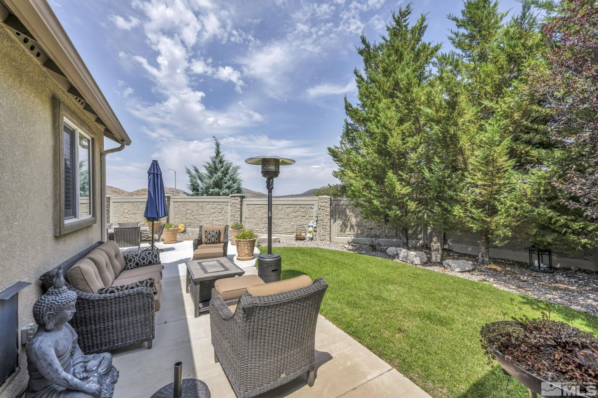 2199 Angel Ridge Drive Reno, NV 89521 - Photo 32 of 36 a backyard of a house with table and chairs