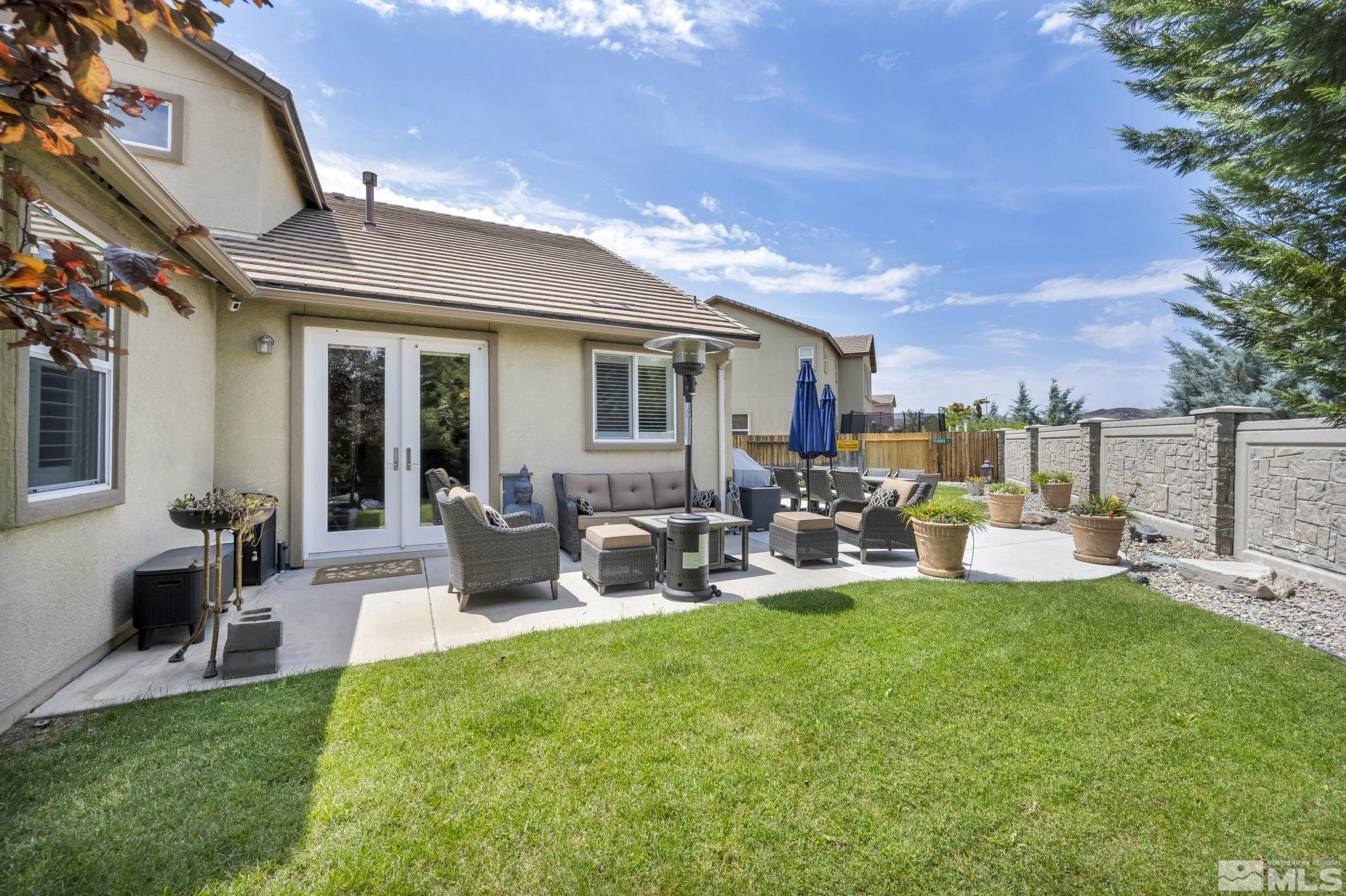 2199 Angel Ridge Drive Reno, NV 89521 - Photo 33 of 36 a view of a house with backyard and sitting area