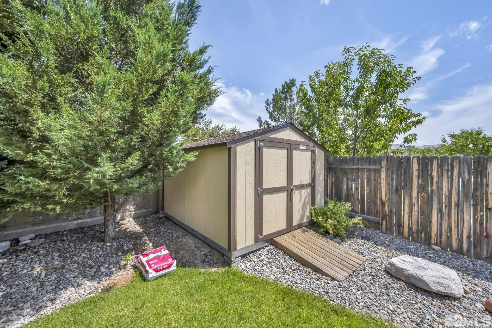 2199 Angel Ridge Drive Reno, NV 89521 - Photo 36 of 36 a backyard of a house with lots of green space