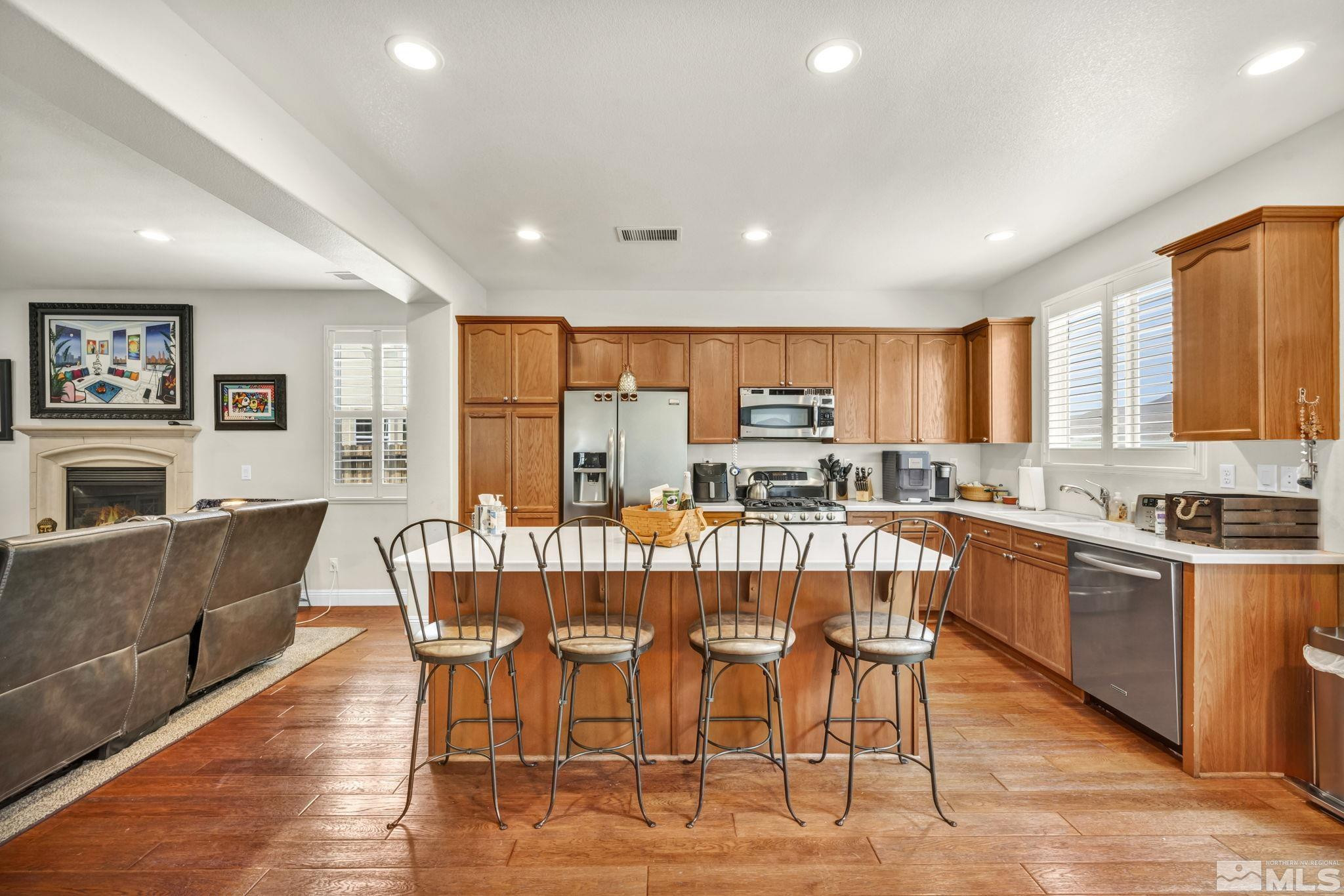 2199 Angel Ridge Drive Reno, NV 89521 - Photo 5 of 36 a view of a dining room with furniture window and wooden floor