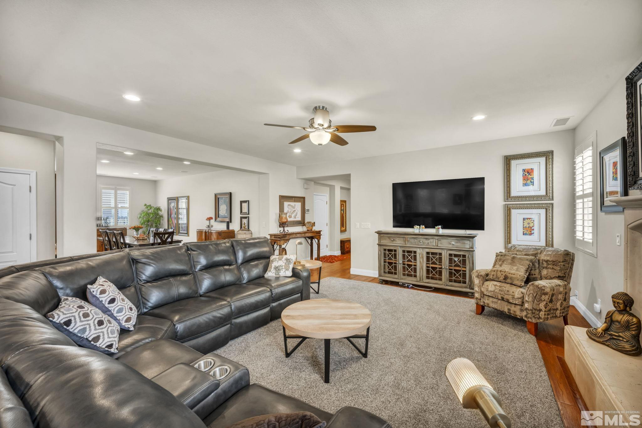 2199 Angel Ridge Drive Reno, NV 89521 - Photo 7 of 36 a living room with furniture and a flat screen tv
