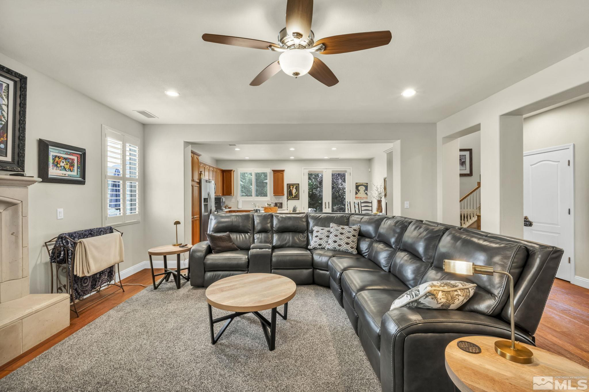 2199 Angel Ridge Drive Reno, NV 89521 - Photo 8 of 36 a living room with furniture and a chair