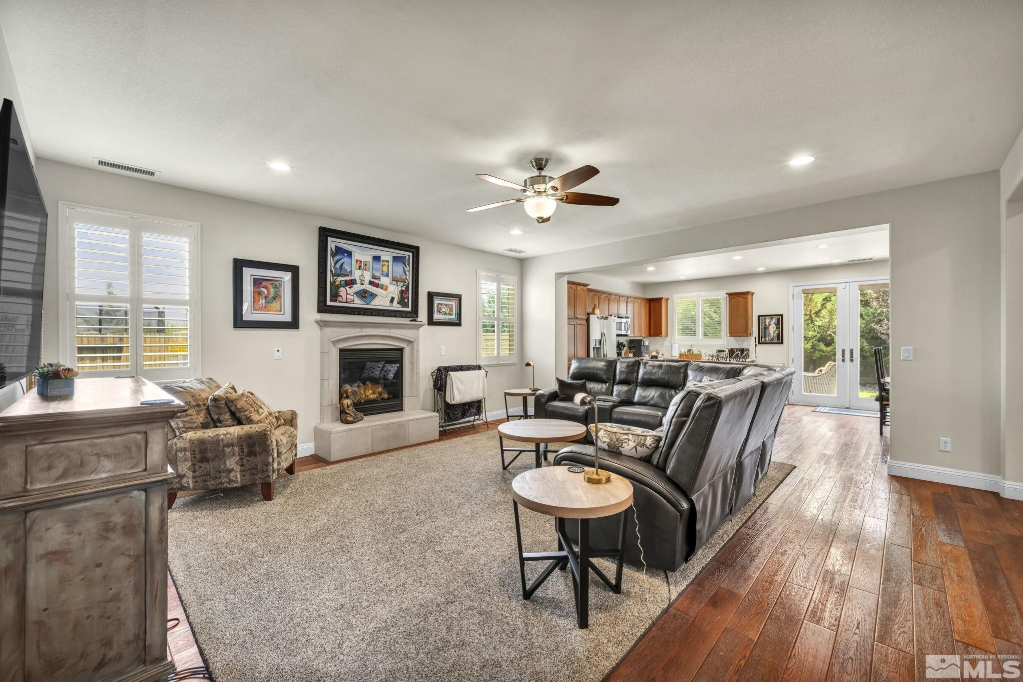 2199 Angel Ridge Drive Reno, NV 89521 - Photo 9 of 36 a living room with furniture fireplace and a table