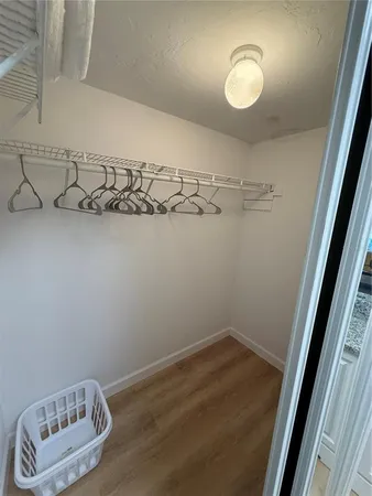 a view of a room with racks on the wall