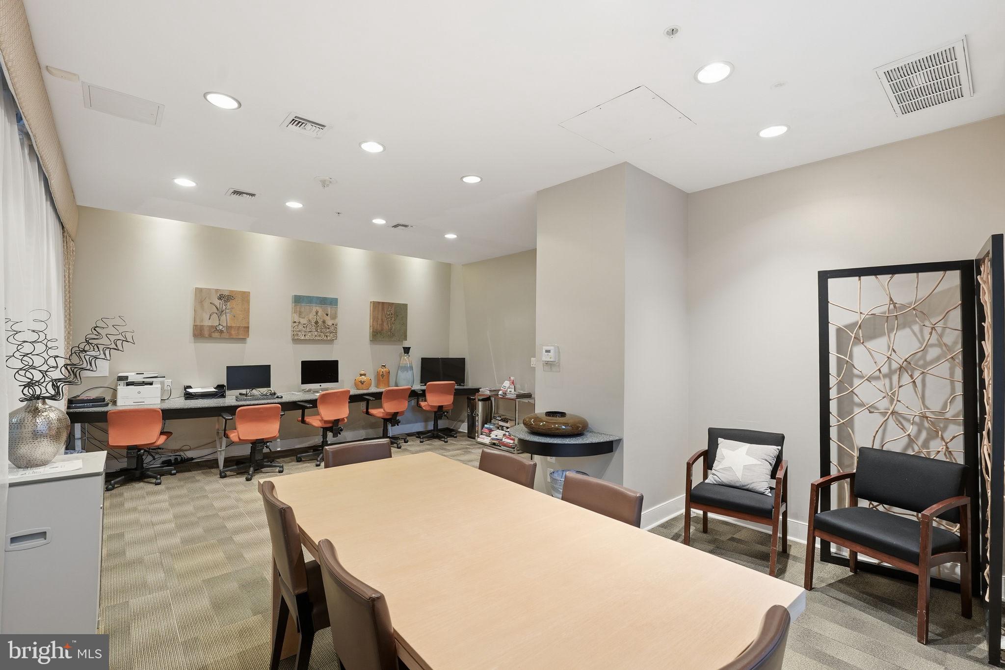 820 North Pollard Street, Unit 504 Arlington, VA 22203 - Photo 24 of 27 a living room with furniture a rug and white walls