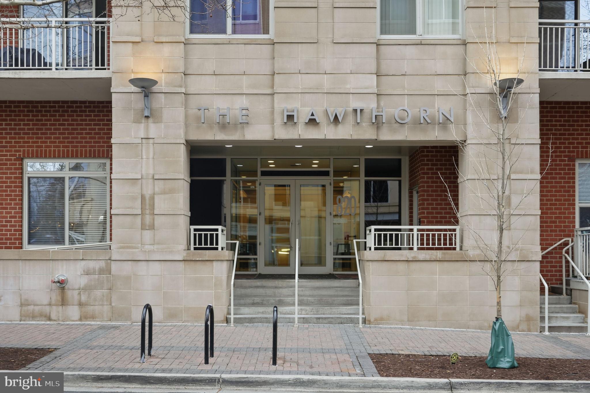 820 North Pollard Street, Unit 504 Arlington, VA 22203 - Photo 27 of 27 a view of a brick building with large windows