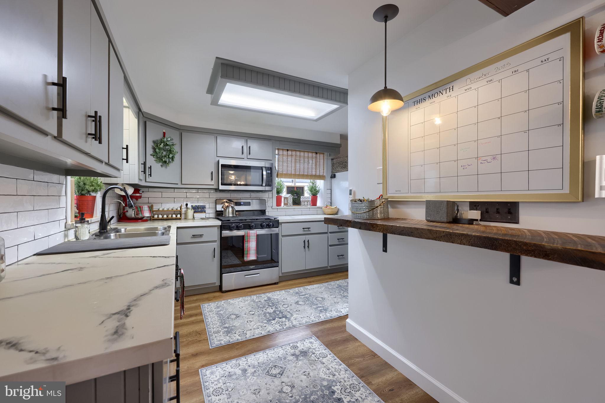 39 North Maple Avenue Leola, PA 17540 - Photo 16 of 44 a kitchen with stove cabinets and a sink