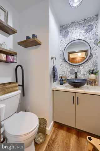 a bathroom with a toilet and a sink