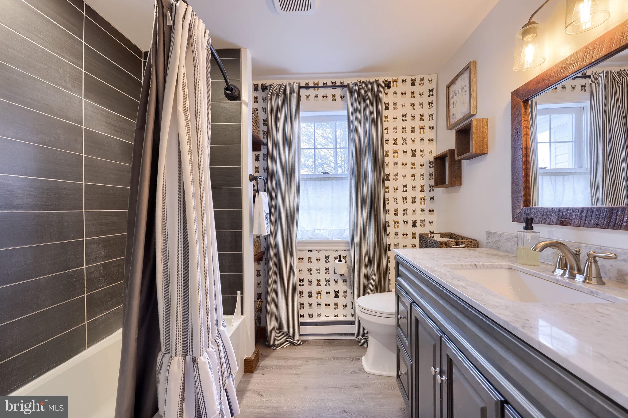 39 North Maple Avenue Leola, PA 17540 - Photo 26 of 44 a bathroom with a sink a toilet and shower