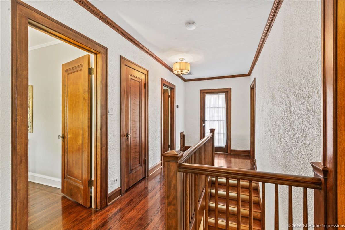 9955 South Hamilton Avenue Chicago, IL 60643 - Photo 17 of 31 a view of a hallway with wooden floor and staircase