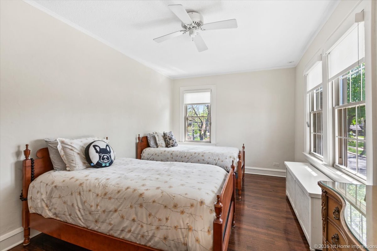 9955 South Hamilton Avenue Chicago, IL 60643 - Photo 19 of 31 a bedroom with a large bed and a window