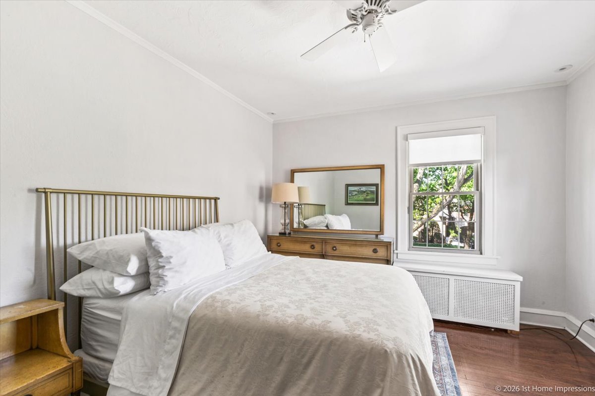 9955 South Hamilton Avenue Chicago, IL 60643 - Photo 20 of 31 a bedroom with a large bed and a window